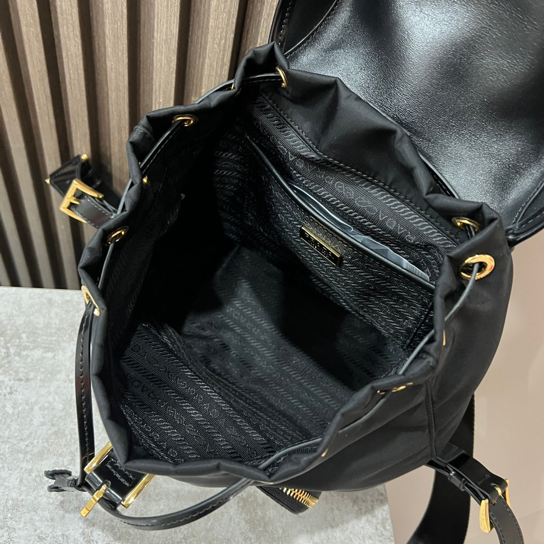 BACKPACK 25 IN BLACK RE-NYLON AND GLOSSY CALFSKIN GOLD HARDWARE