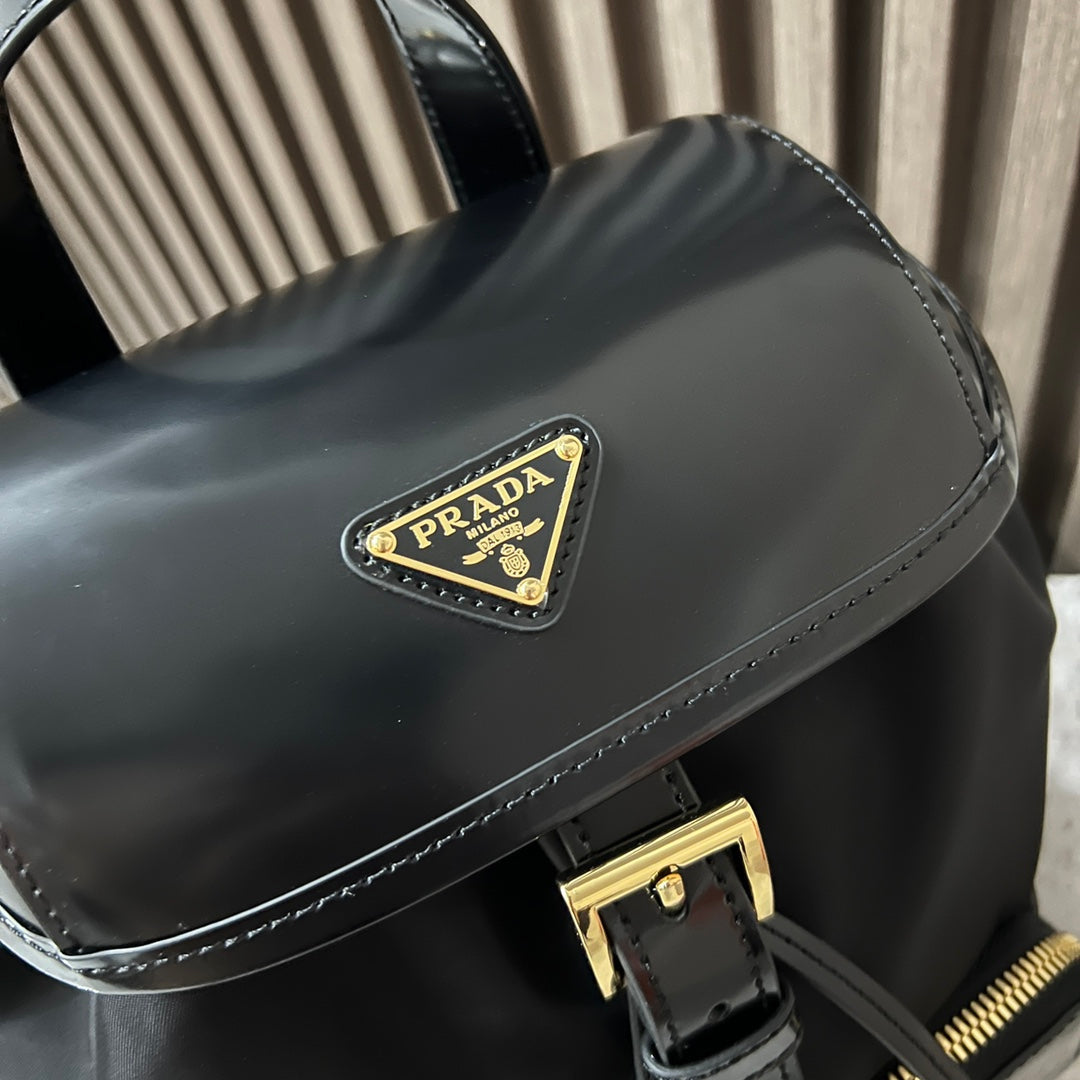 BACKPACK 25 IN BLACK RE-NYLON AND GLOSSY CALFSKIN GOLD HARDWARE