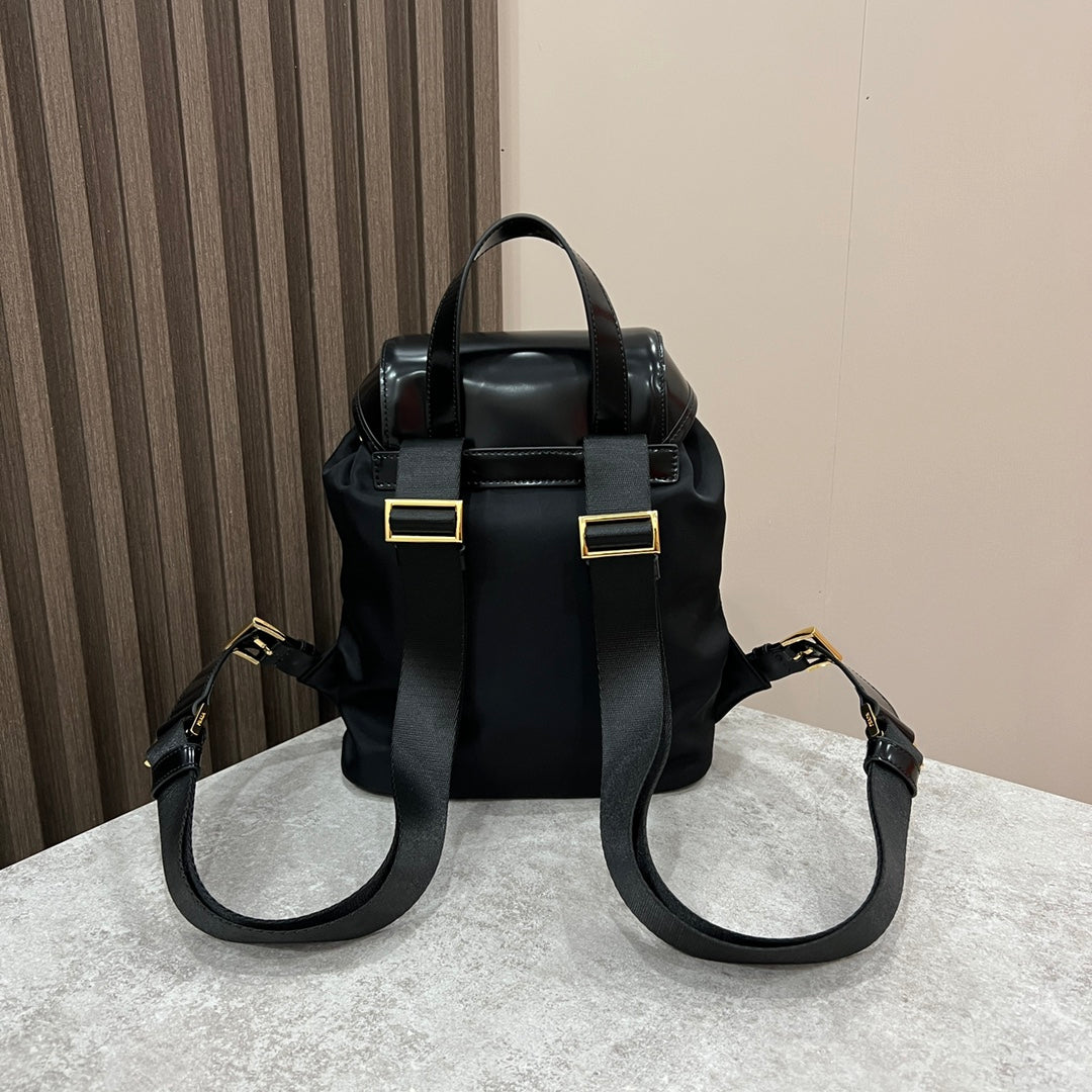 BACKPACK 25 IN BLACK RE-NYLON AND GLOSSY CALFSKIN GOLD HARDWARE