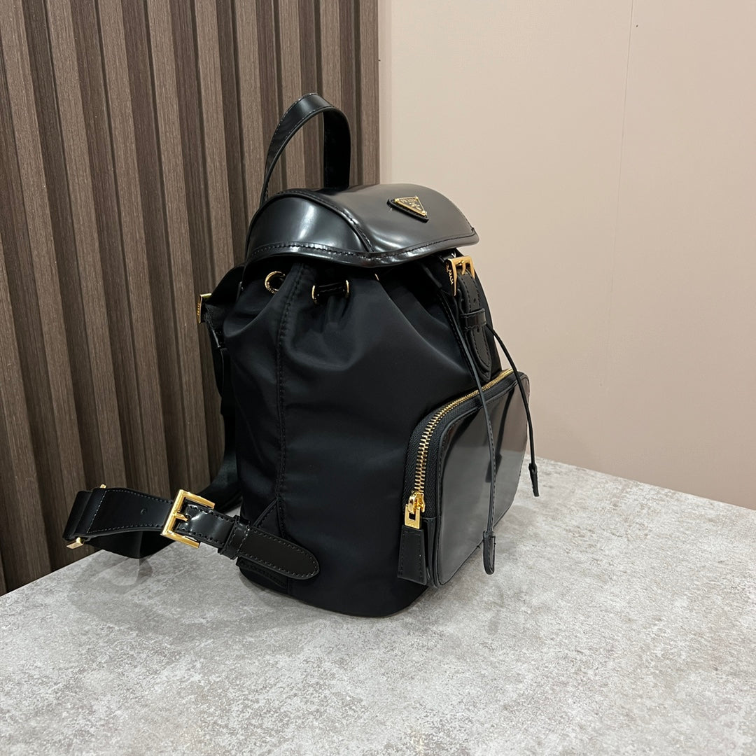 BACKPACK 25 IN BLACK RE-NYLON AND GLOSSY CALFSKIN GOLD HARDWARE