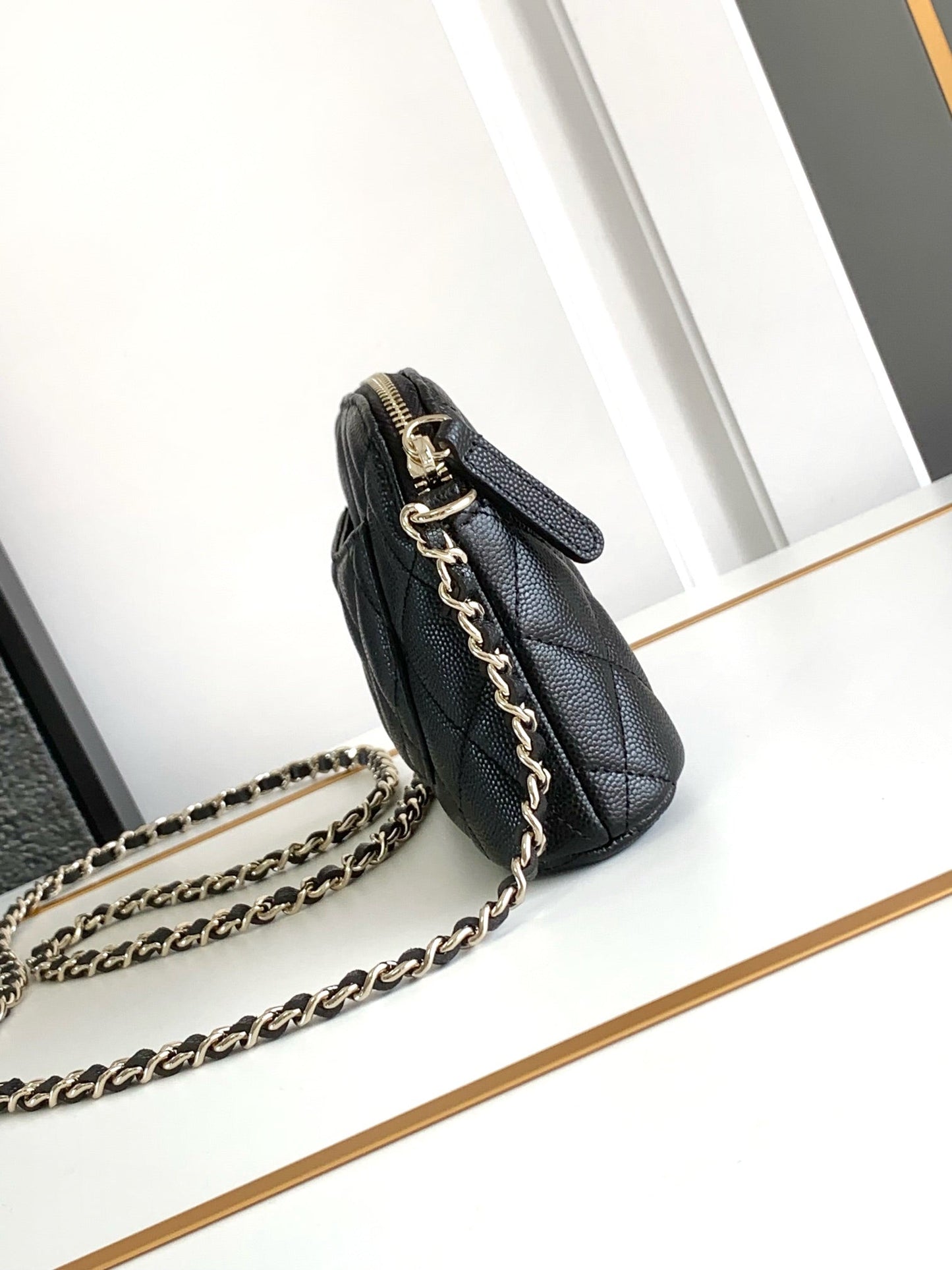 CC MINI 16 CAVIAR CLUTCH IN BLACK CALFSKIN