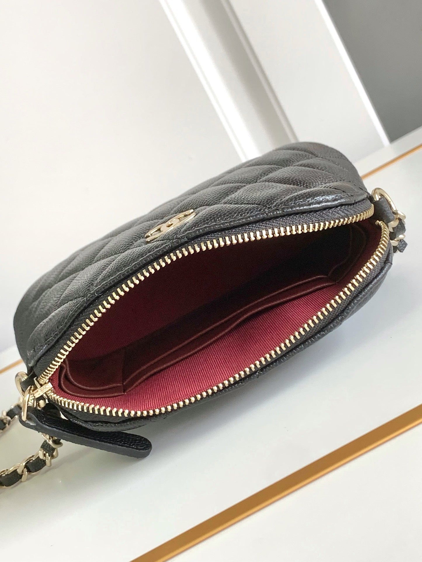 CC MINI 16 CAVIAR CLUTCH IN BLACK CALFSKIN