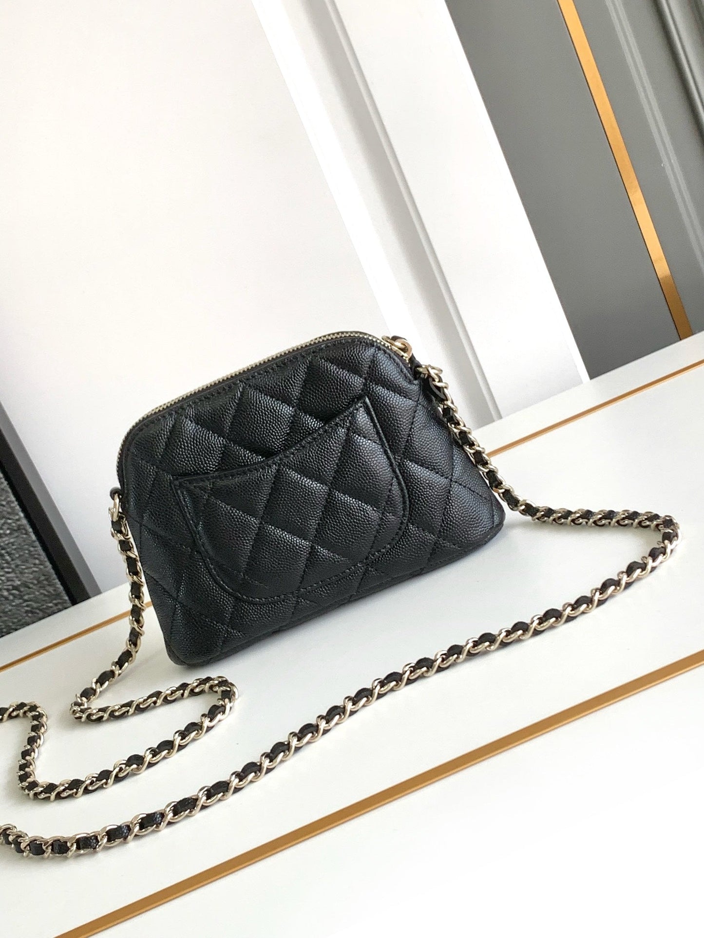 CC MINI 16 CAVIAR CLUTCH IN BLACK CALFSKIN