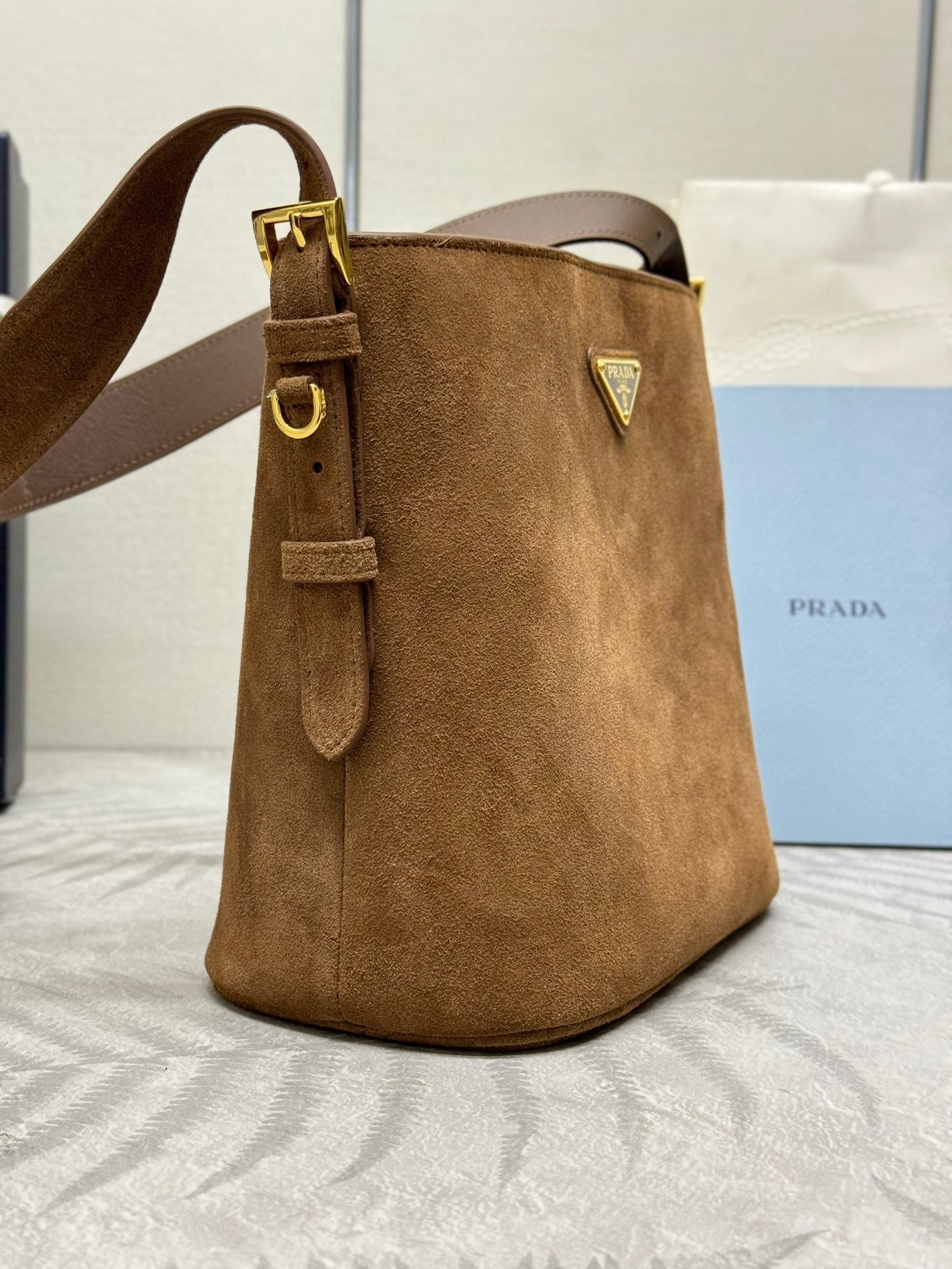 BUCKET BAG 22 IN RUSSET BROWN SOFT SUEDE