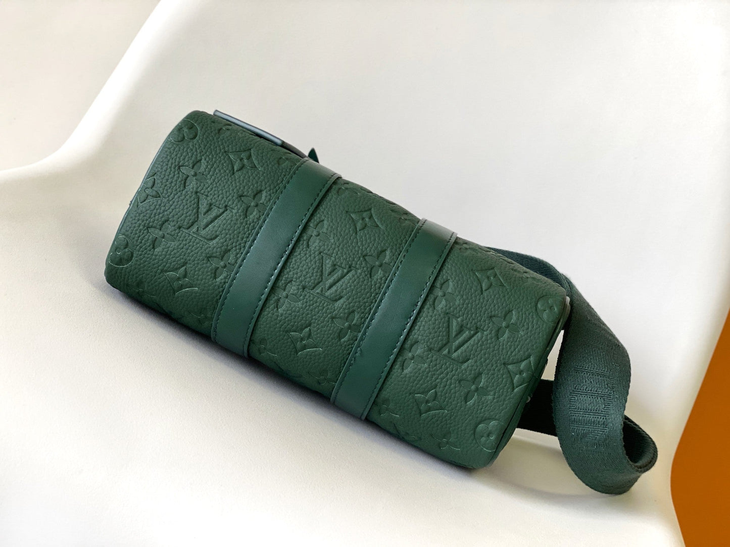 KEEPALL BANDOULIÈRE 25 IN FOREST GREEN MONOGRAM EMBOSSED CALFSKIN