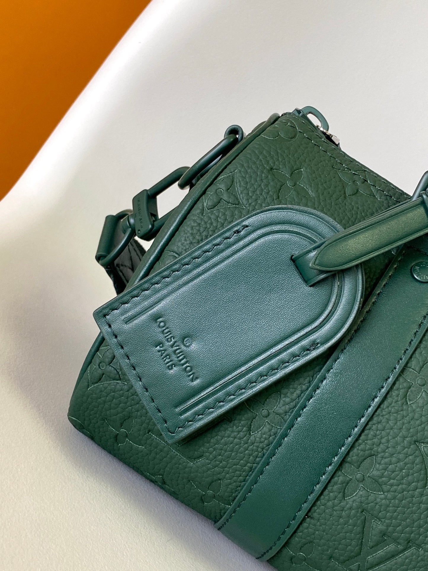 KEEPALL BANDOULIÈRE 25 IN FOREST GREEN MONOGRAM EMBOSSED CALFSKIN