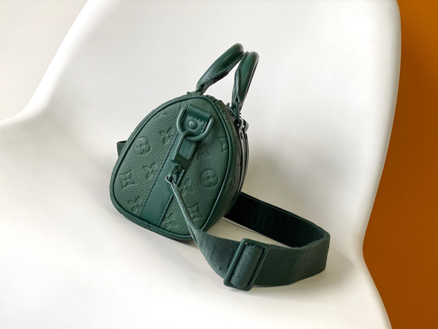 KEEPALL BANDOULIÈRE 25 IN FOREST GREEN MONOGRAM EMBOSSED CALFSKIN