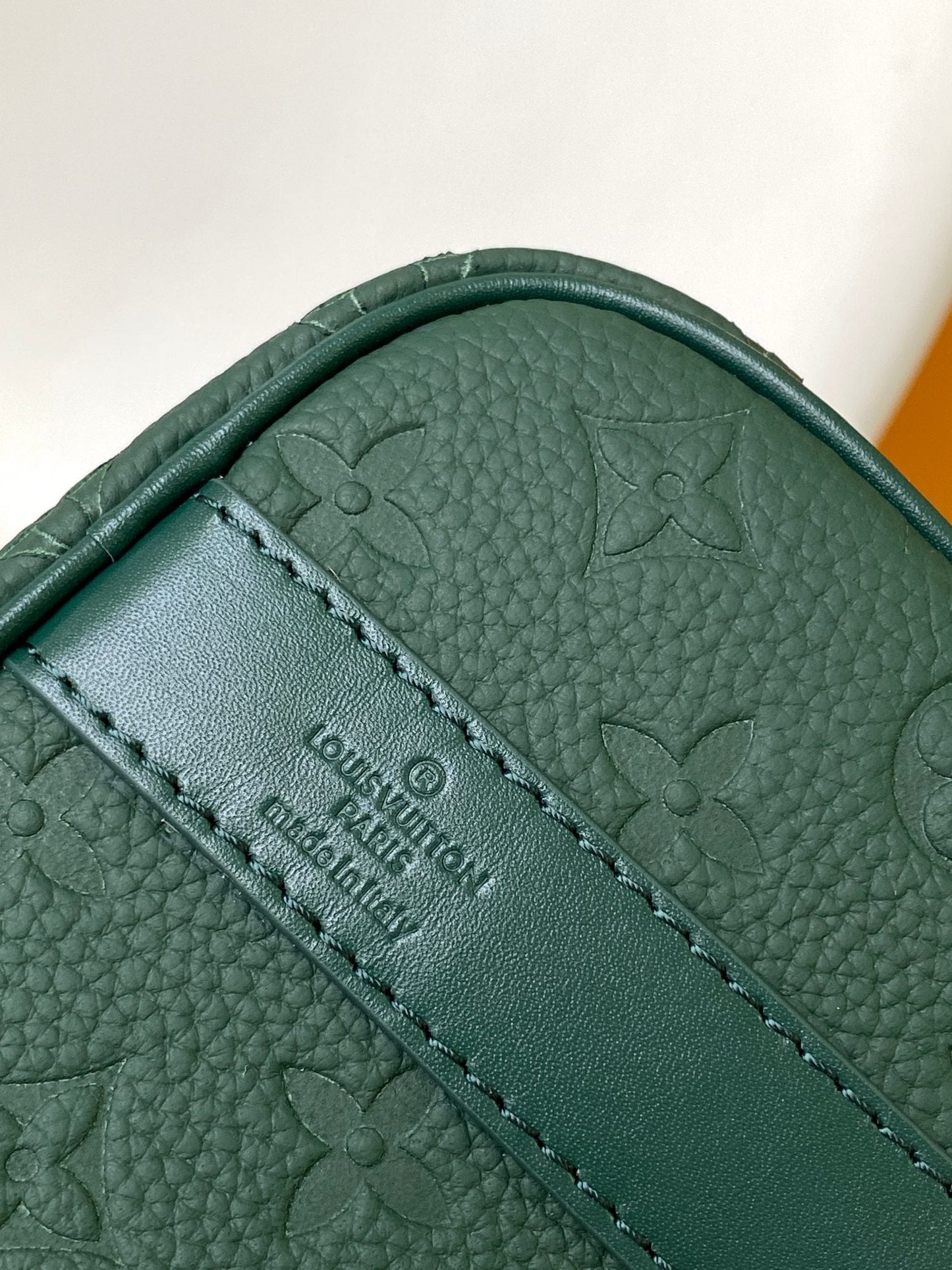 KEEPALL BANDOULIÈRE 25 IN FOREST GREEN MONOGRAM EMBOSSED CALFSKIN