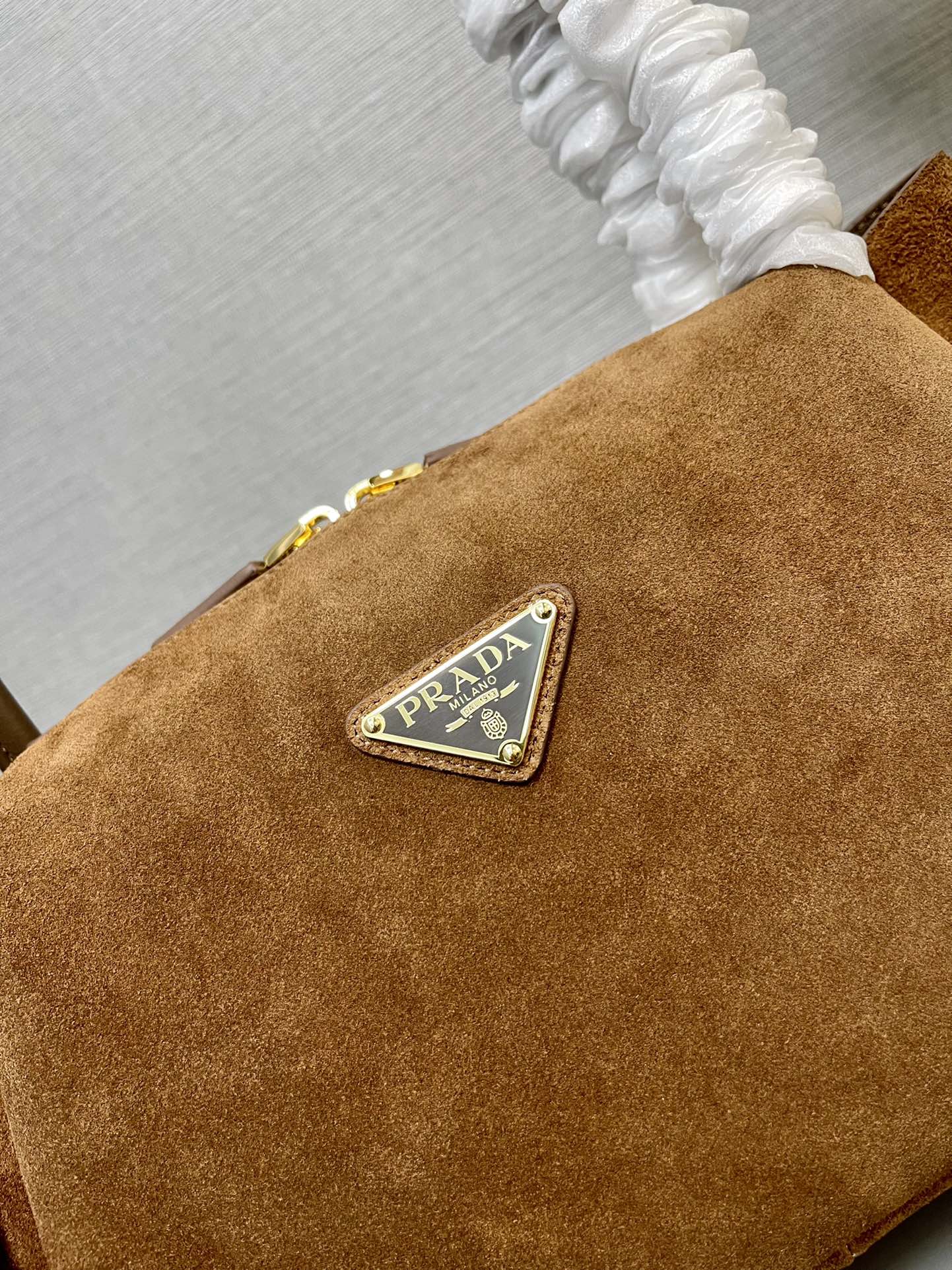 SHOULDER BAG 28 IN TAWNY BROWN SUEDE GOLD LOGO