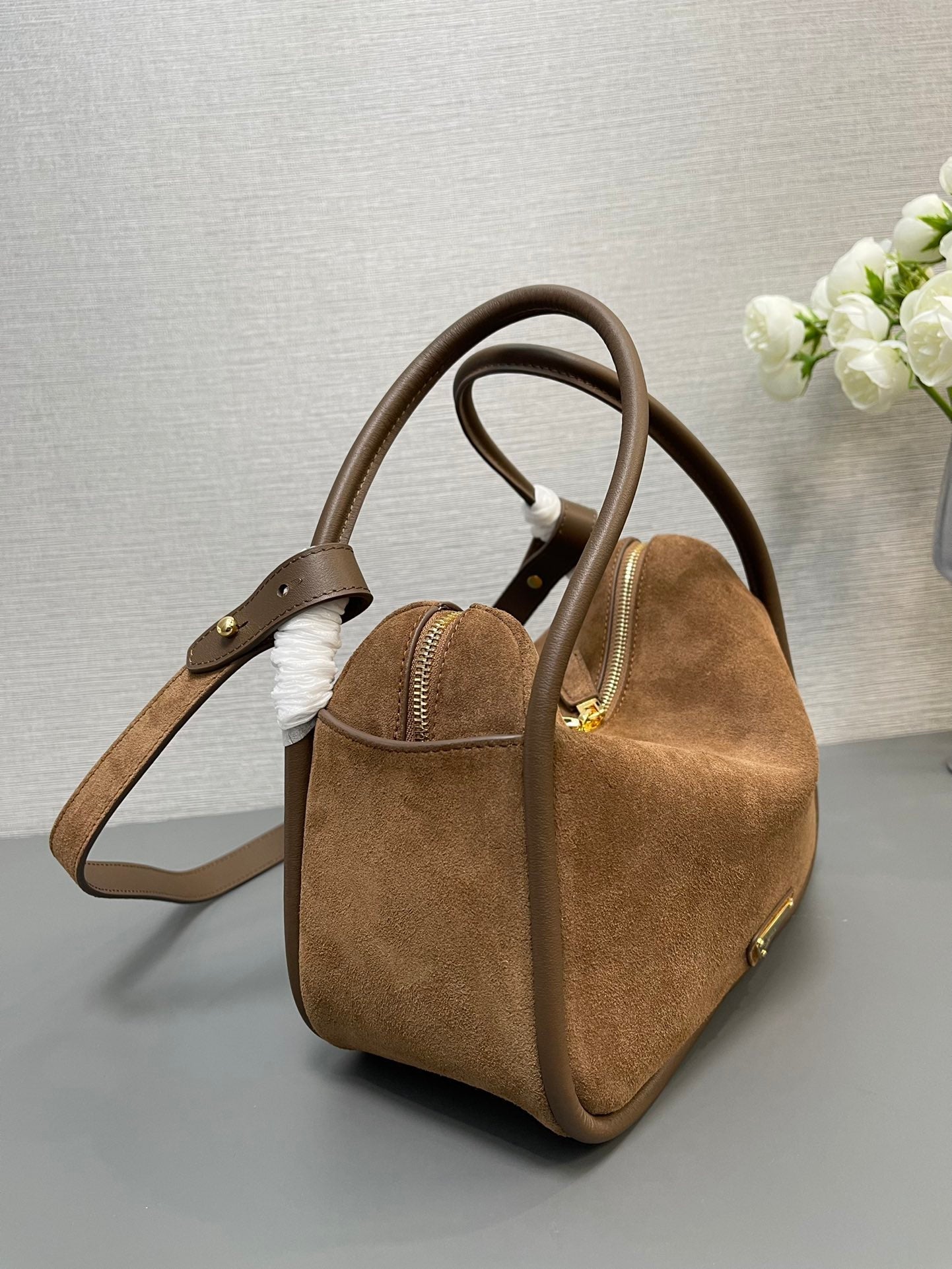 BOWLING BAG 25 IN ASH BROWN SUEDE AND CALFSKIN TRIM GOLD LOGO