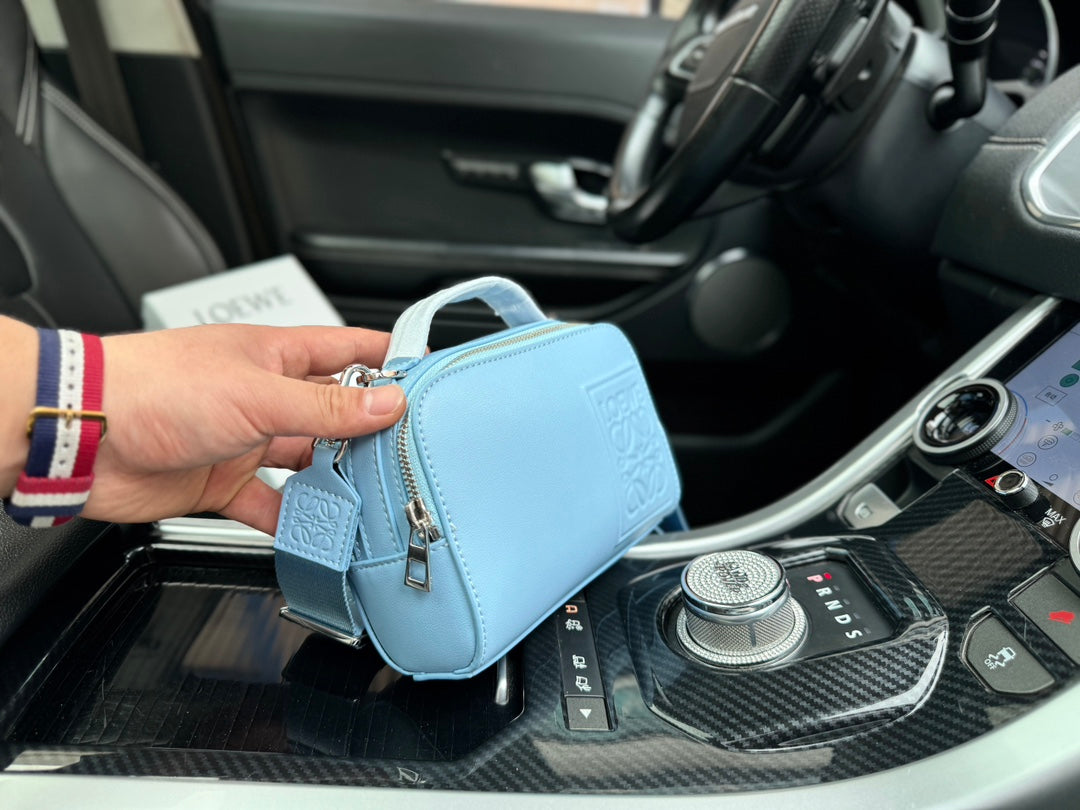 LOE MINI 18 CAMERA CROSS BODY BAG IN LIGHT BLUE CALFSKIN