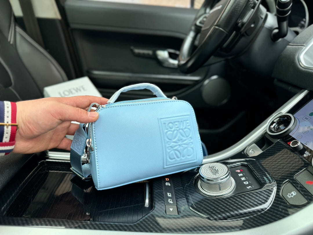 LOE MINI 18 CAMERA CROSS BODY BAG IN LIGHT BLUE CALFSKIN