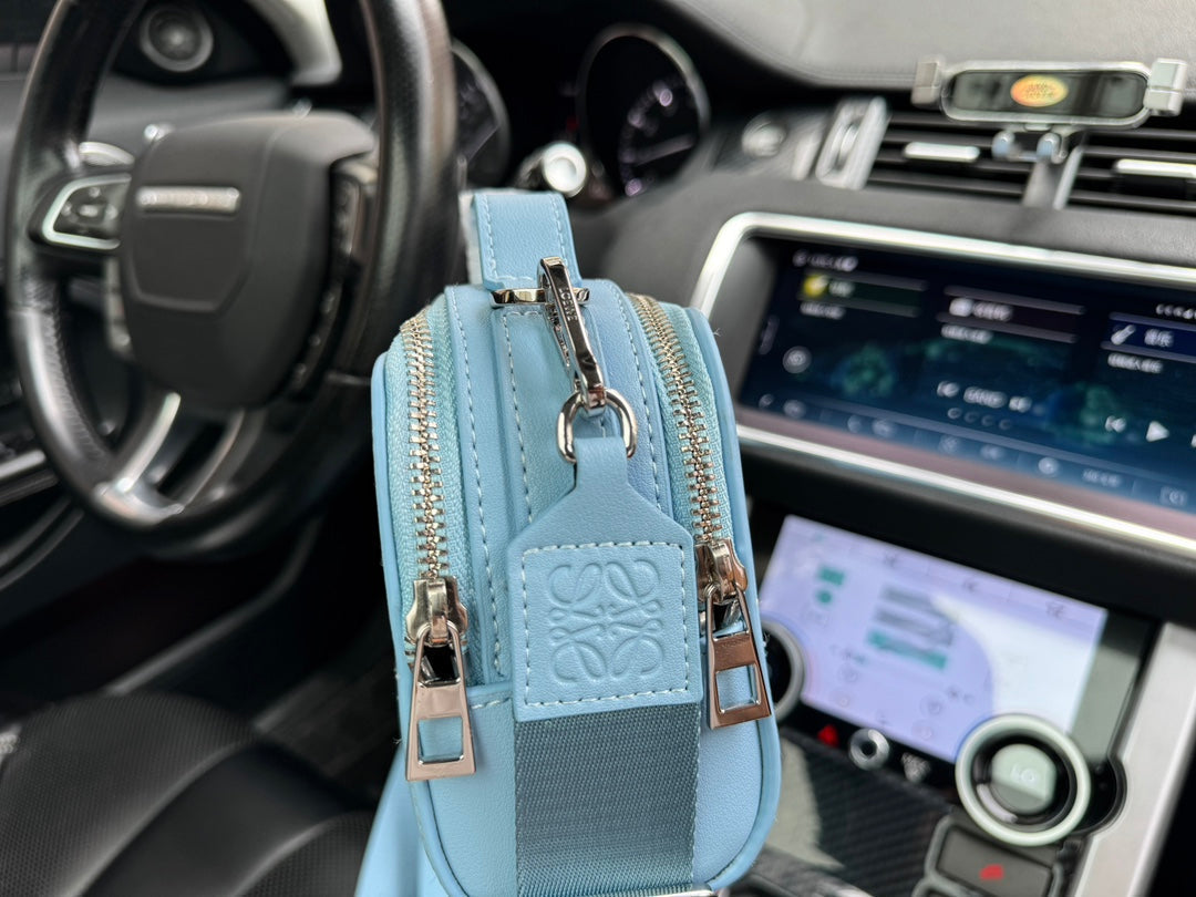 LOE MINI 18 CAMERA CROSS BODY BAG IN LIGHT BLUE CALFSKIN