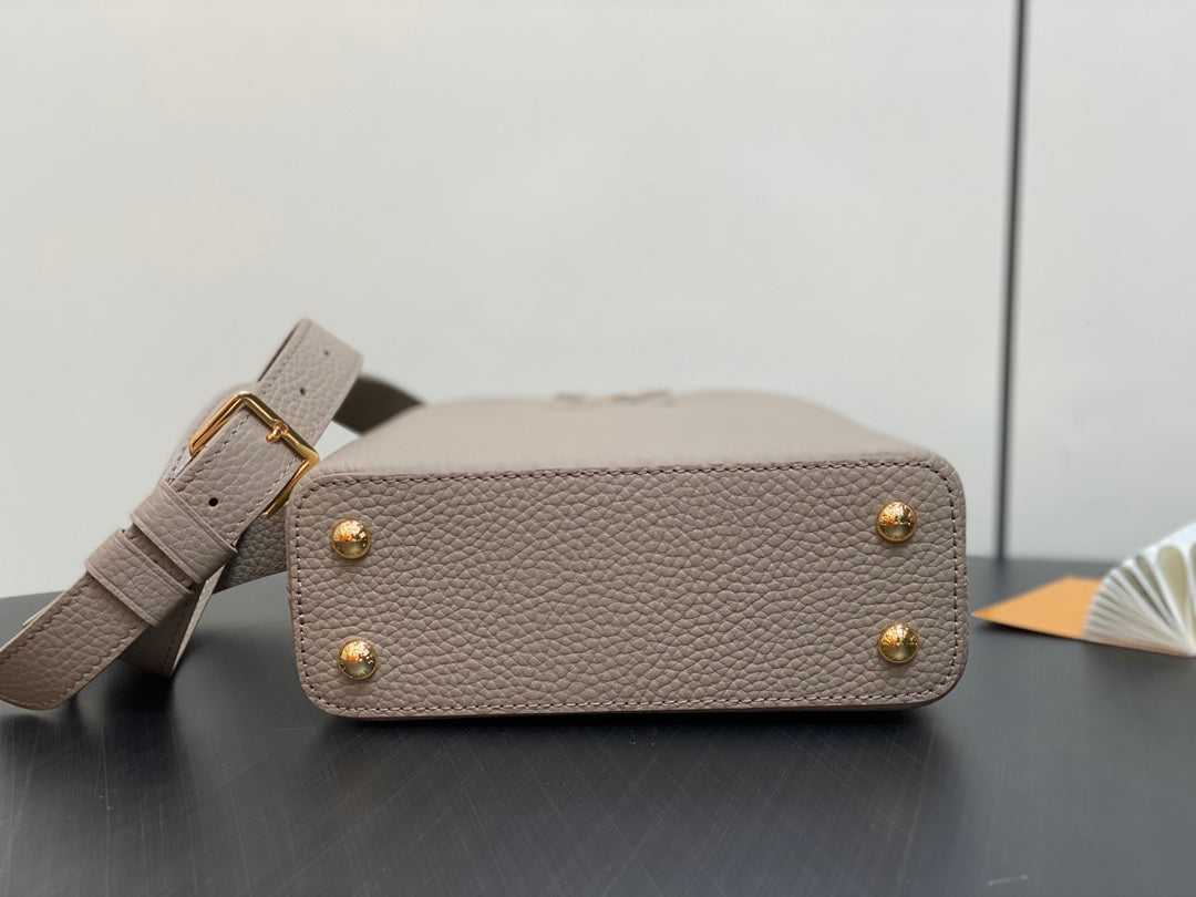 CAPUCINES MINI 21 IN KHAKI BROWN TAURILLON