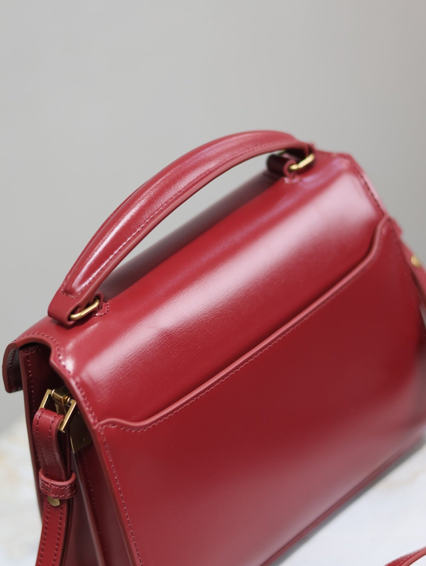 CASSANDRA MINI TOP HANDLE BAG 20 IN RED CALFSKIN GOLD HARDWARE