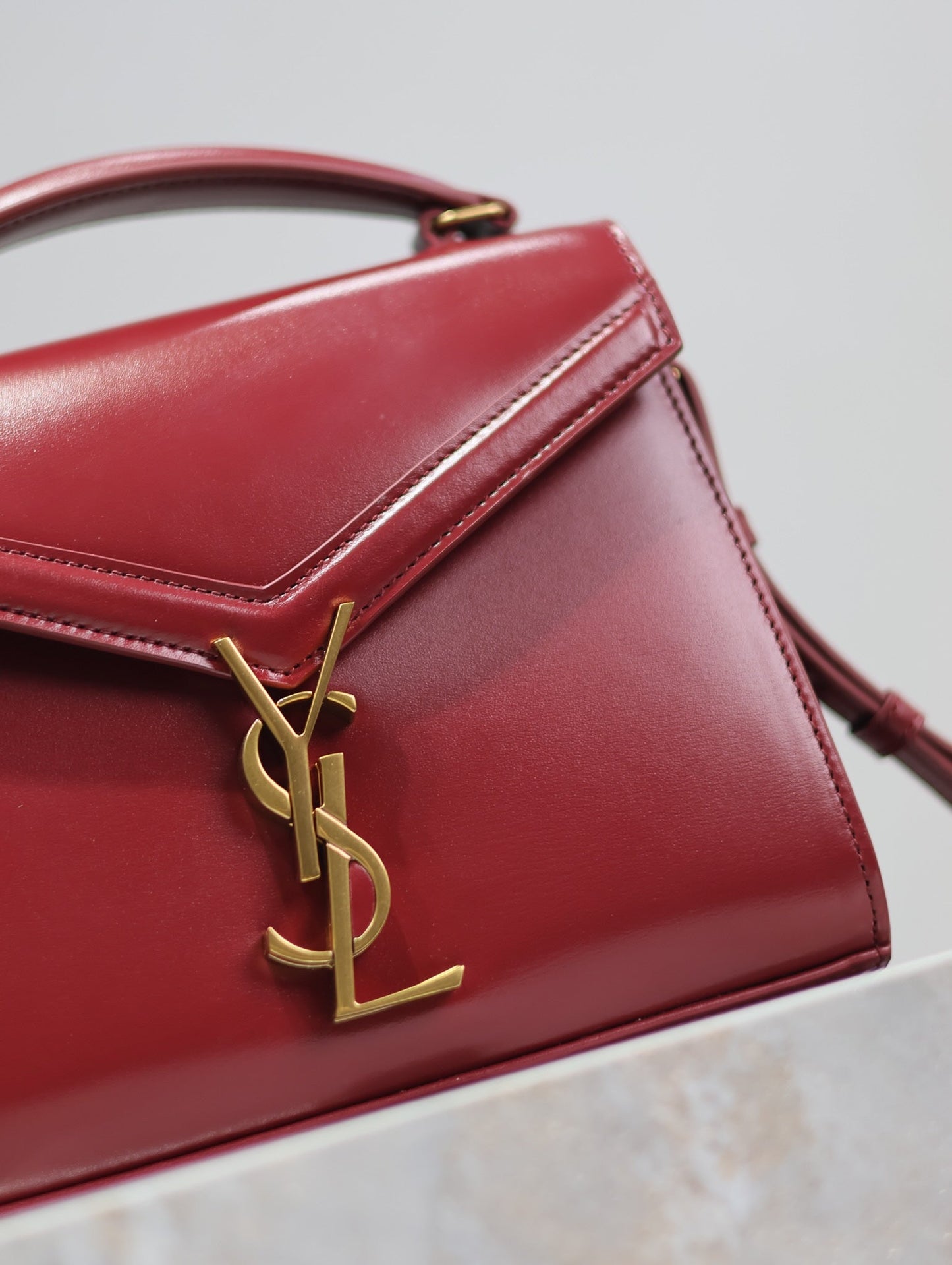 CASSANDRA MINI TOP HANDLE BAG 20 IN RED CALFSKIN GOLD HARDWARE