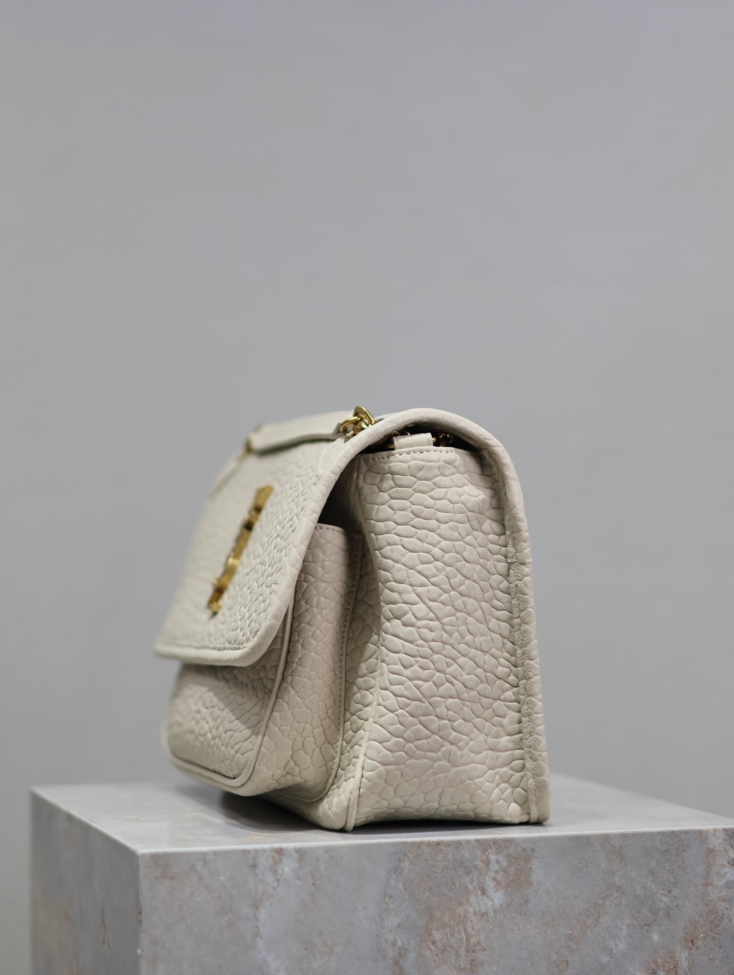 NIKI MEDIUM 28 IN WHITE ELEPHANT PATTERN LAMBSKIN GOLD LOGO