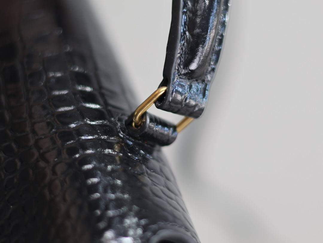 CASSANDRA TOP HANDLE BAG 24 IN BLACK CROCODILE-EMBOSSED GLOSSY CALFSKIN