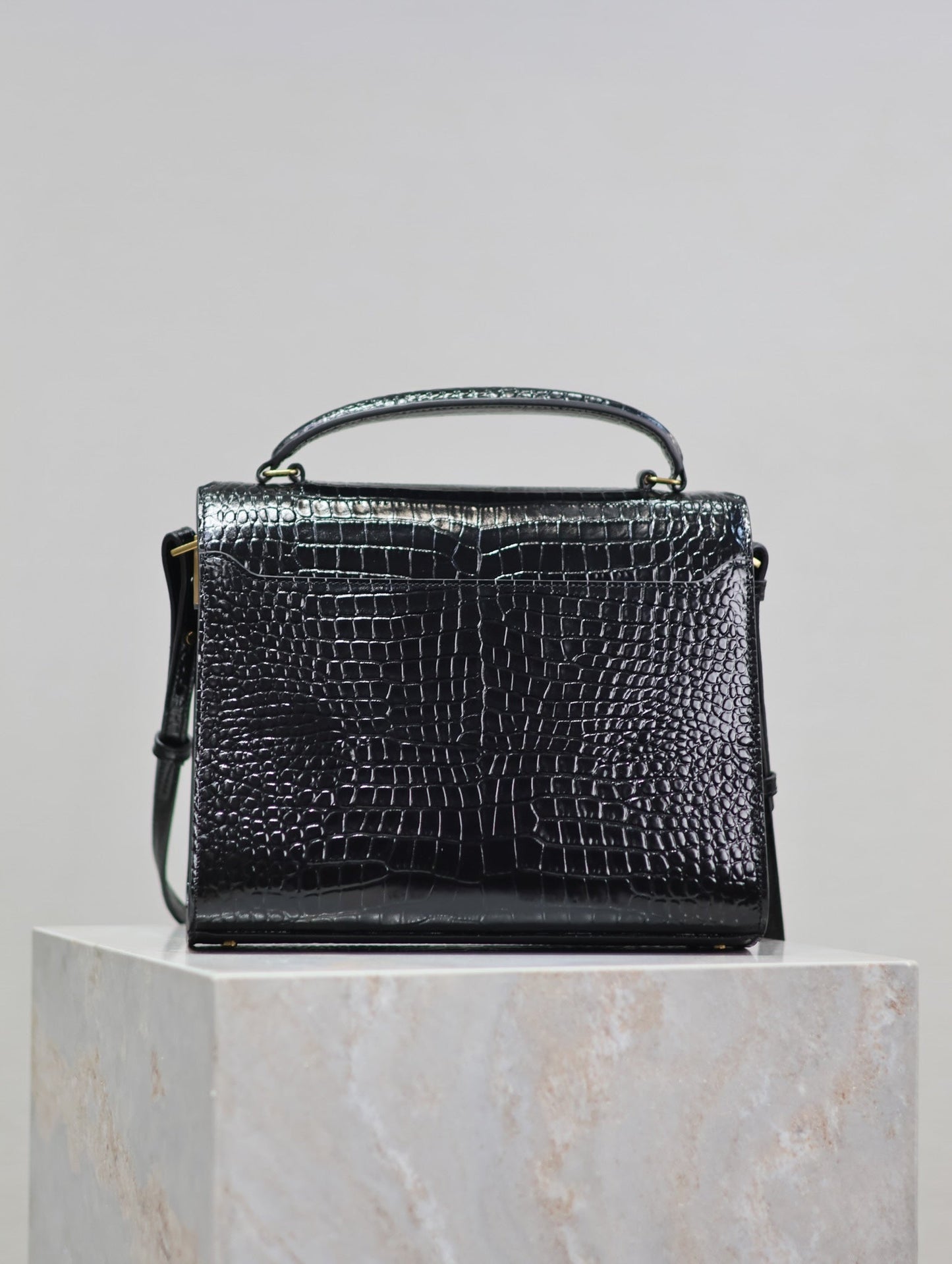 CASSANDRA TOP HANDLE BAG 24 IN BLACK CROCODILE-EMBOSSED GLOSSY CALFSKIN