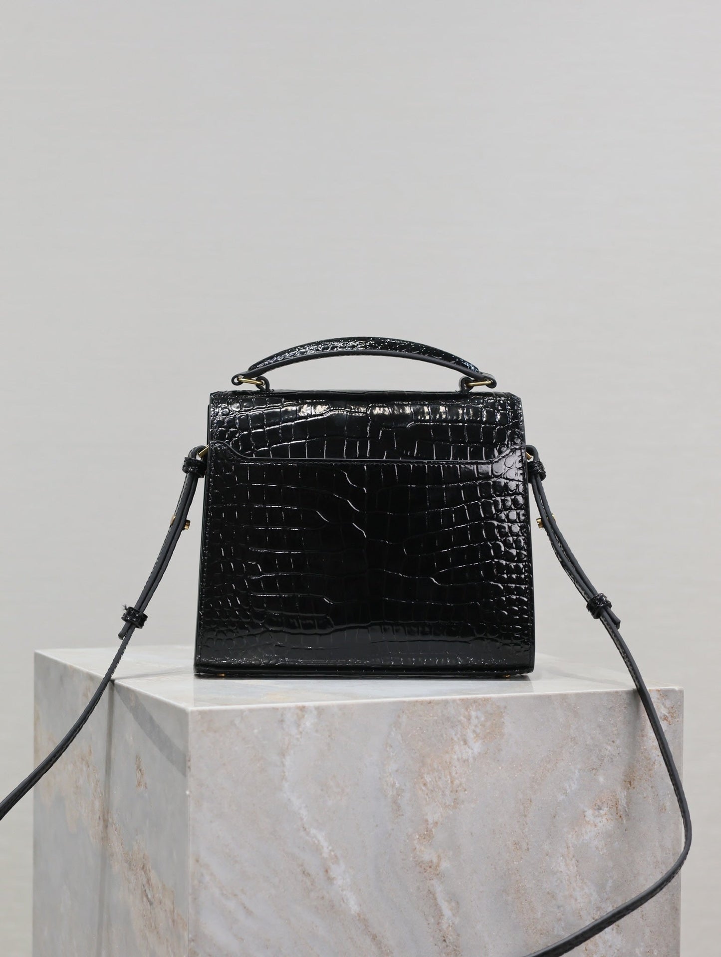 CASSANDRA MINI TOP HANDLE BAG 20 IN BLACK CROCODILE-EMBOSSED GLOSSY CALFSKIN