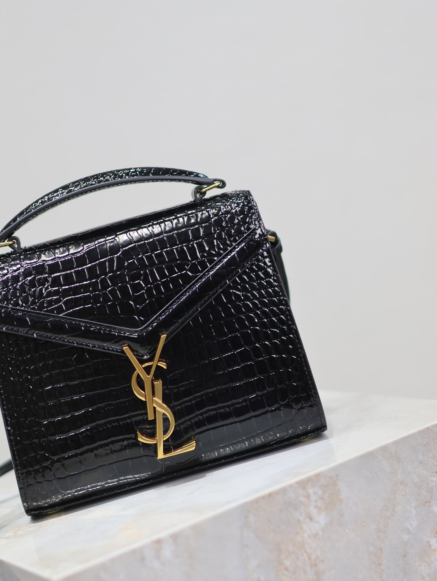 CASSANDRA MINI TOP HANDLE BAG 20 IN BLACK CROCODILE-EMBOSSED GLOSSY CALFSKIN