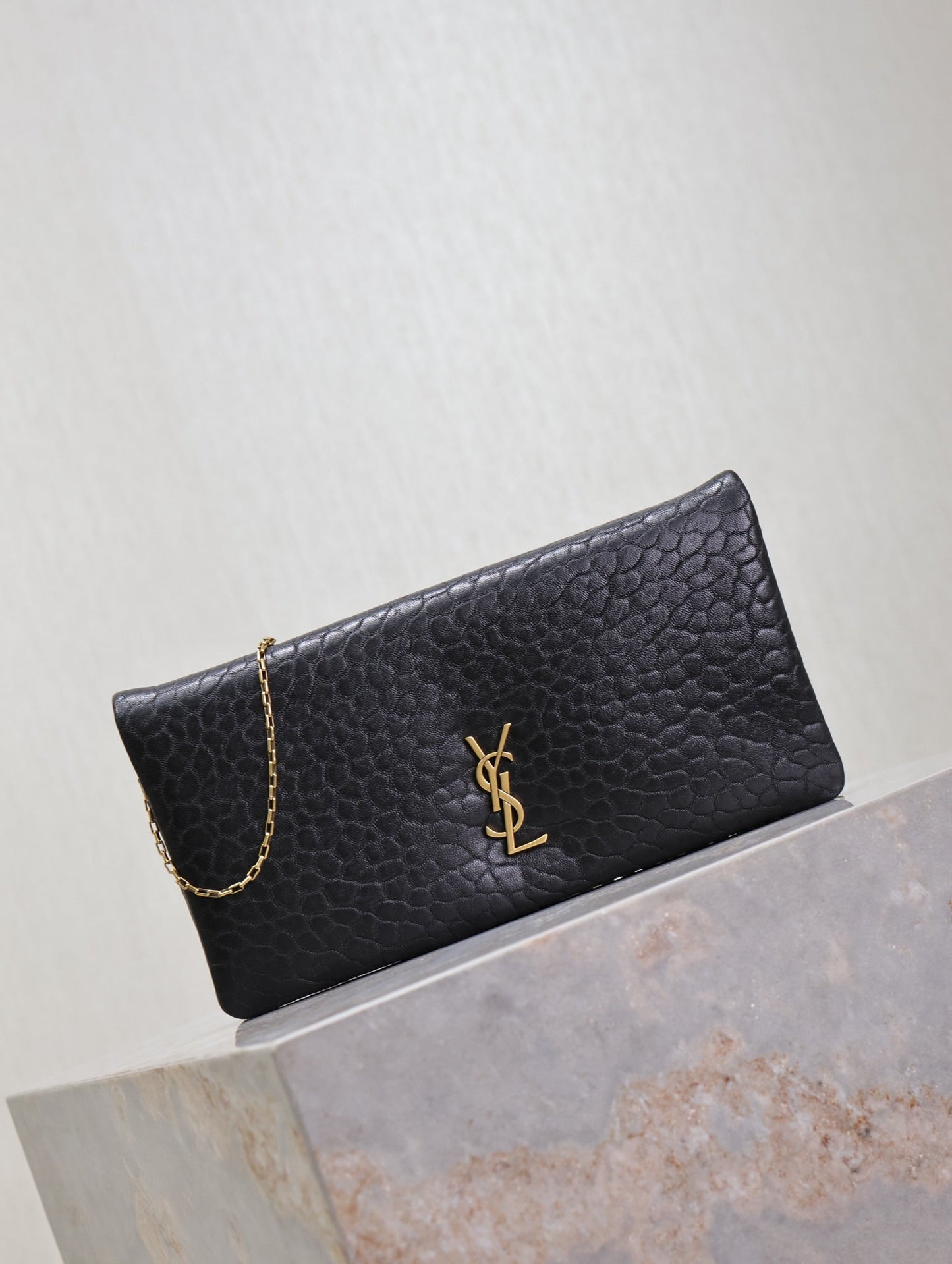 CALYPSO POUCH 24 IN BLACK ELEPHANT TEXTURED LAMBSKIN GOLD LOGO