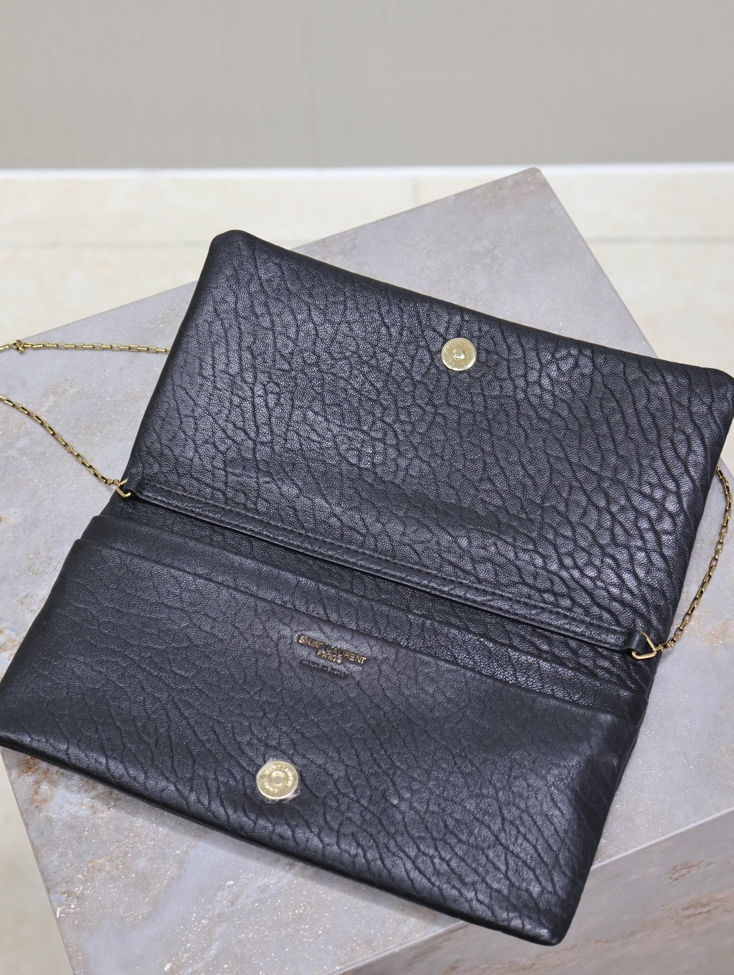 CALYPSO POUCH 24 IN BLACK ELEPHANT TEXTURED LAMBSKIN GOLD LOGO