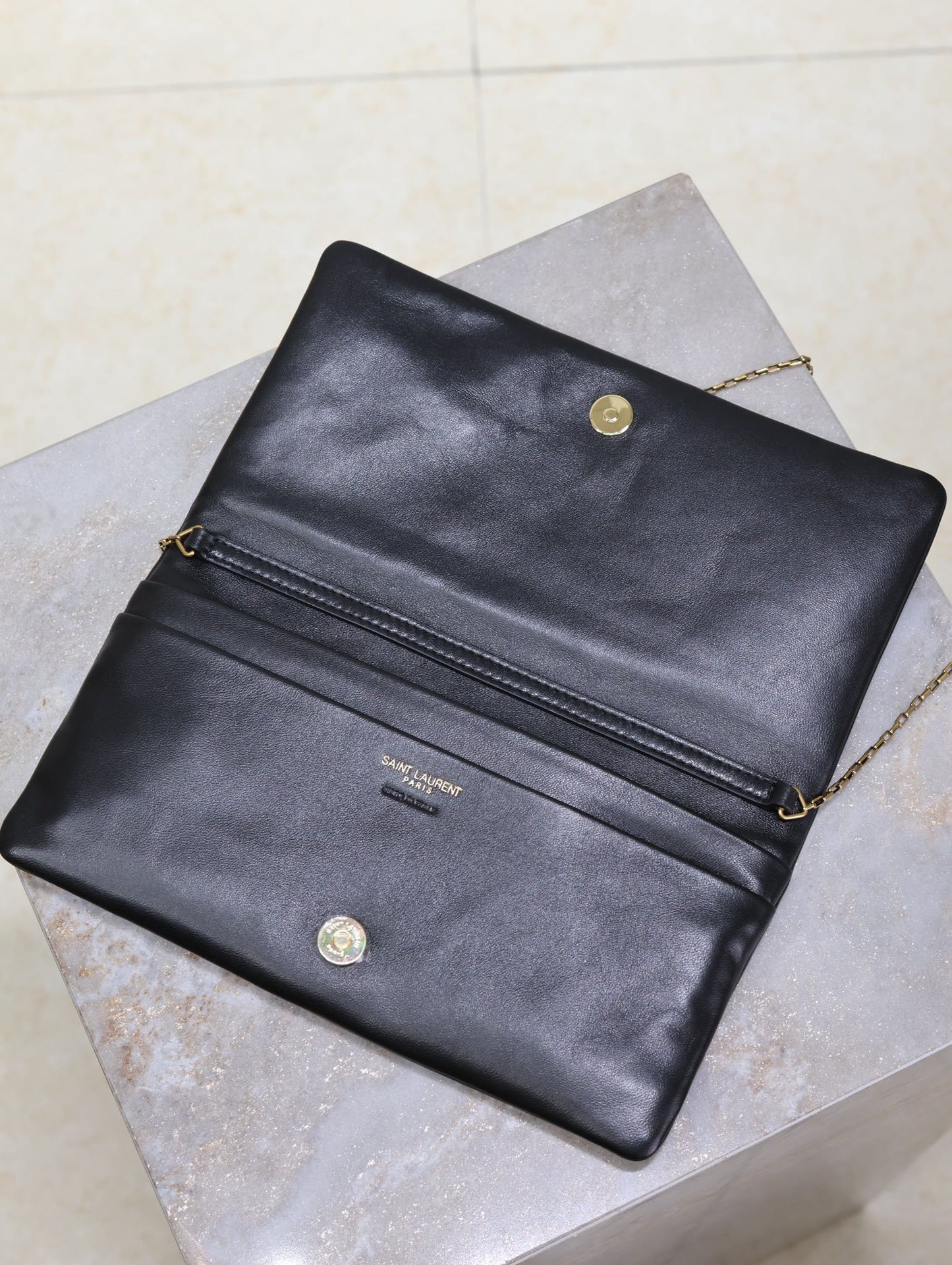 CALYPSO POUCH 24 IN BLACK LAMBSKIN GOLD LOGO