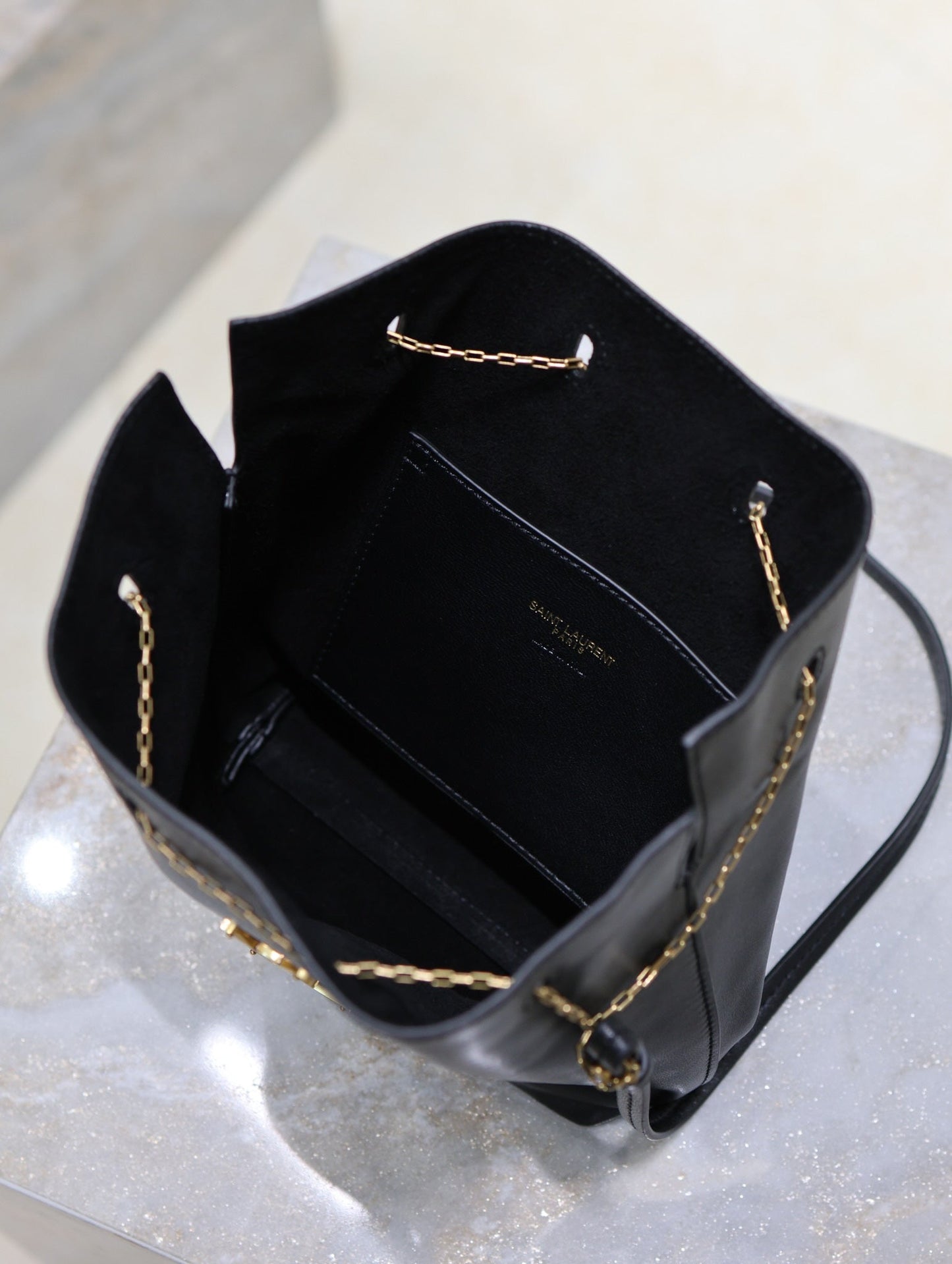 POCHON BUCKET BAG 20 IN BLACK LAMBSKIN GOLD HARDWARE