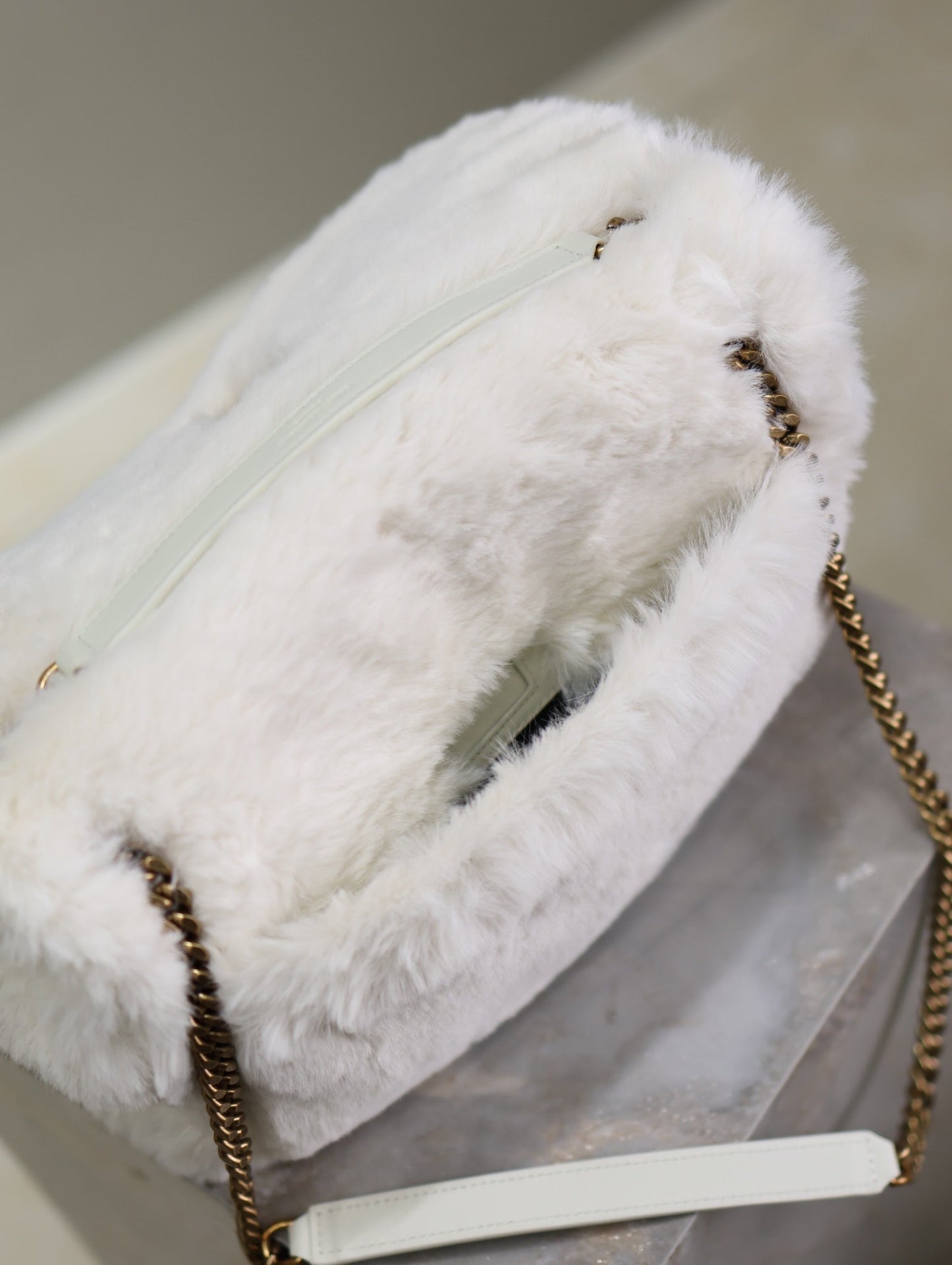 NIKI MEDIUM 28 IN WHITE RABBIT FUR GOLD HARDWARE