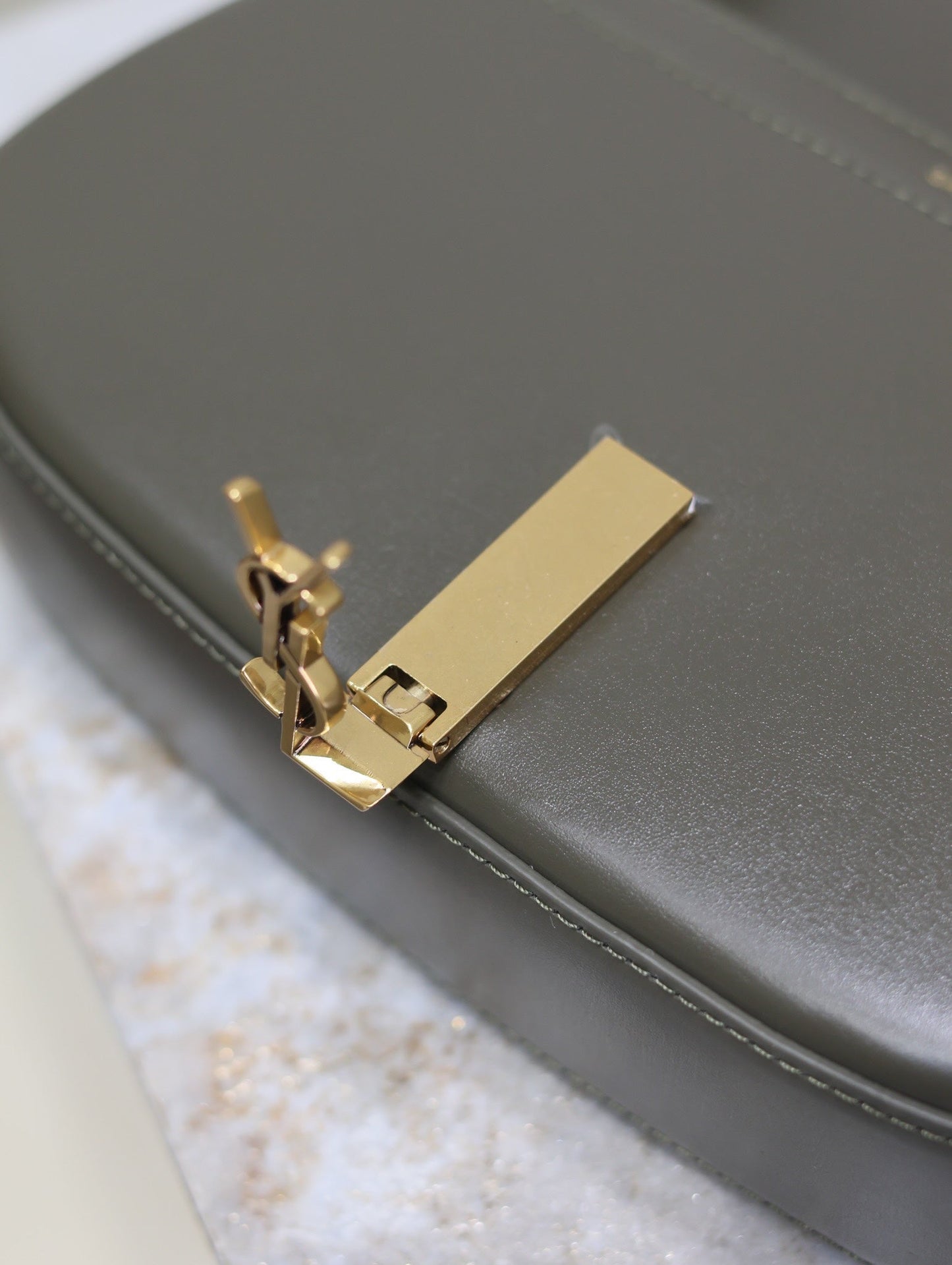 MINI VOLTAIRE IN BOX 17 IN KOMBU GREEN CALFSKIN GOLD LOGO