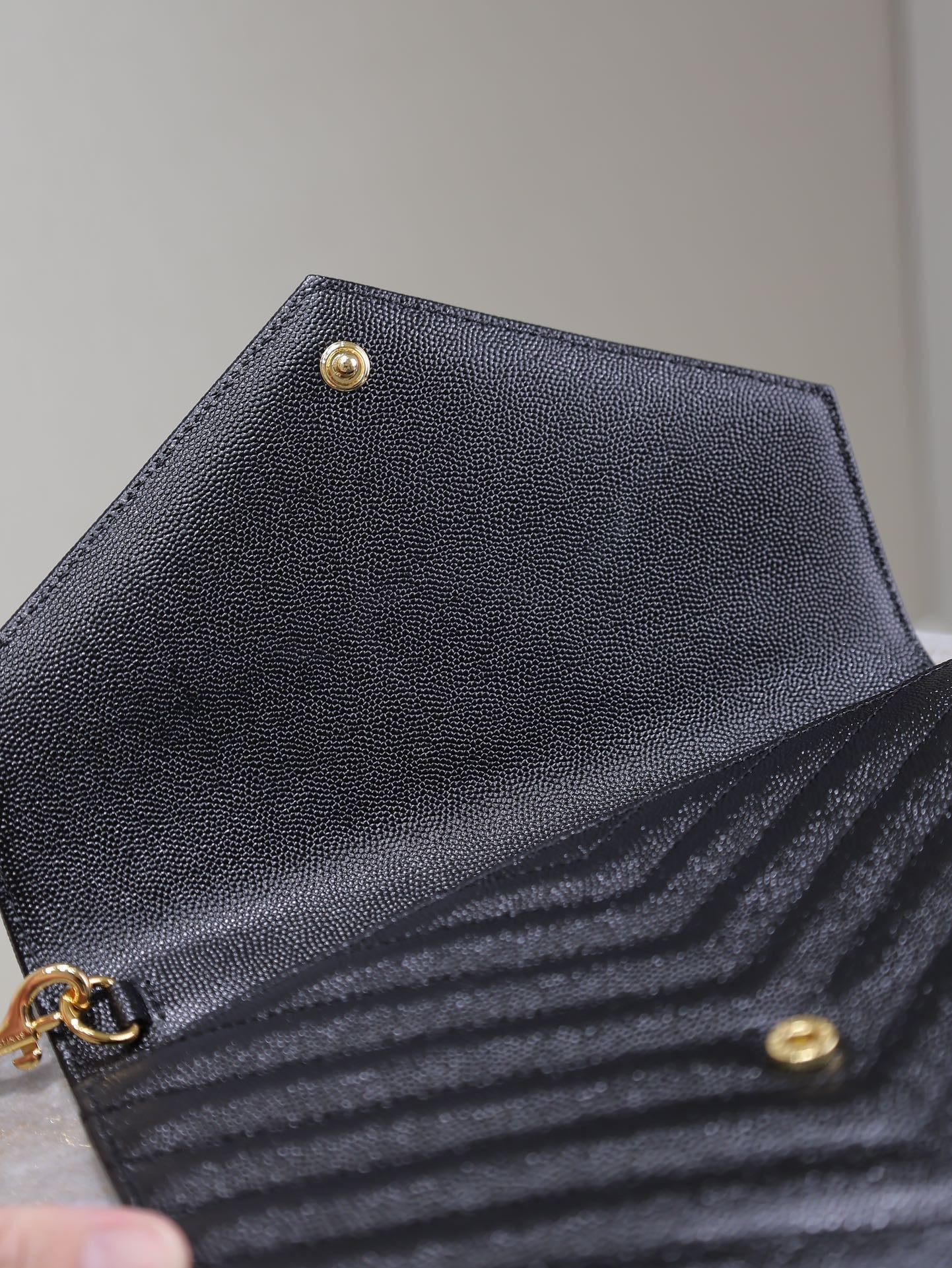 CASSANDRE CLUTCH 21 IN BLACK LAMBSKIN GOLD HARDWARE