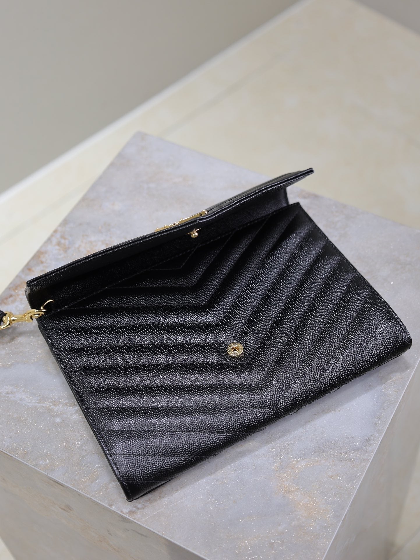 CASSANDRE CLUTCH 21 IN BLACK LAMBSKIN GOLD HARDWARE