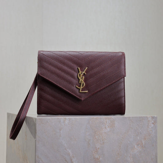 CASSANDRE CLUTCH 21 IN BORDEAUX RED LAMBSKIN GOLD HARDWARE