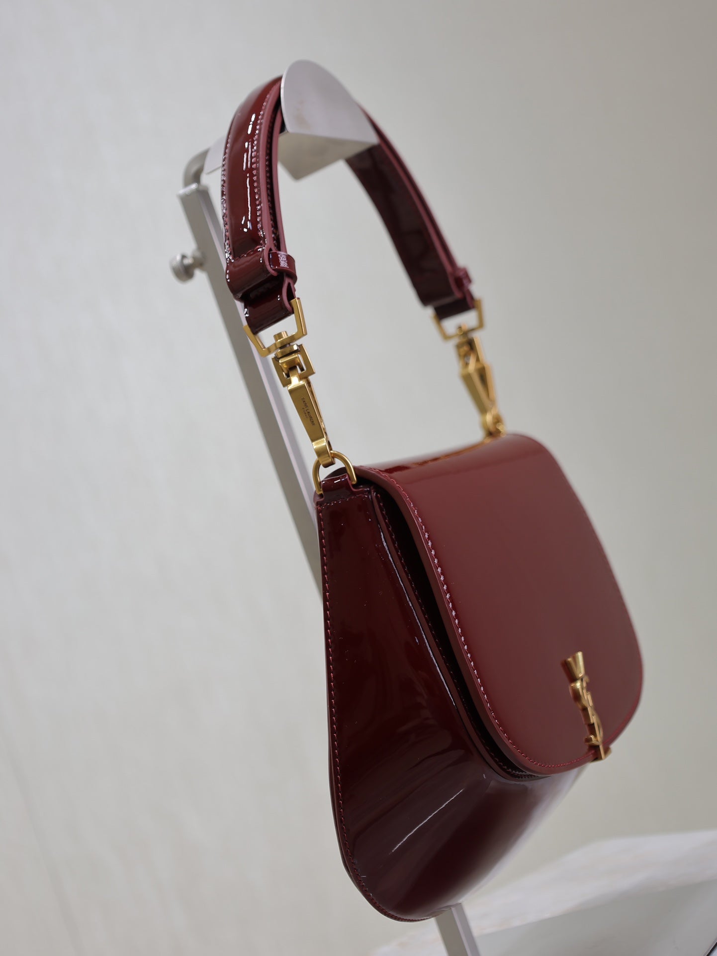 VOLTAIRE SADDLE BAG 21 IN BORDEAUX RED PATENT CALFSKIN