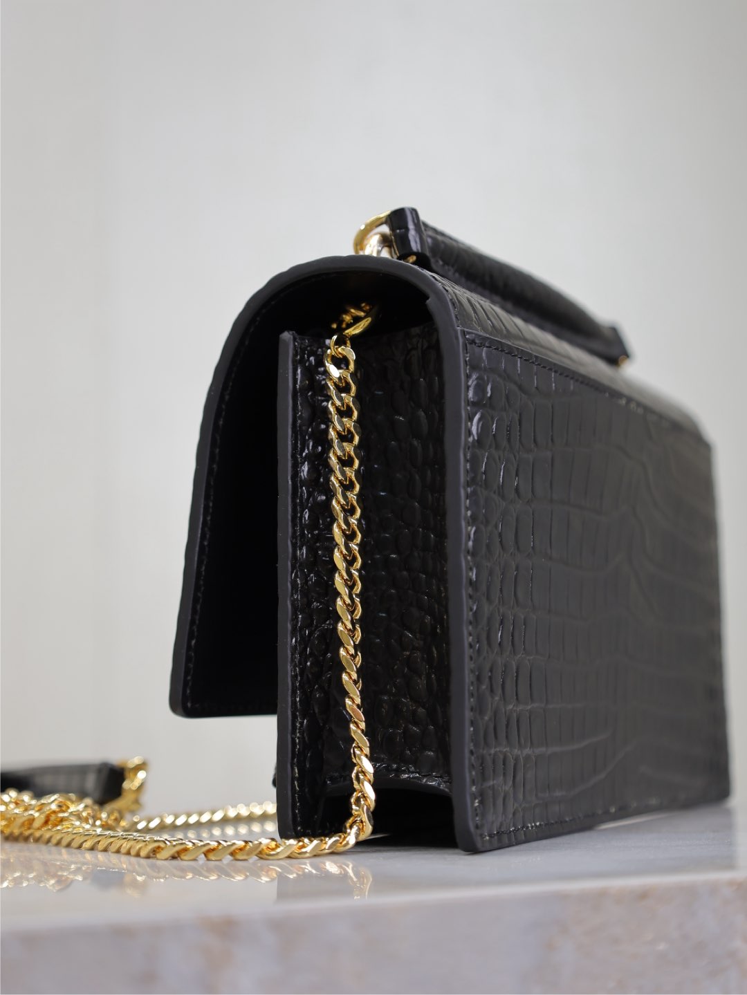 SUNSET SMALL BAG 19 IN BLACK CROCODILE-EMBOSSED CALFSKIN COPPER HARDWARE